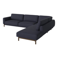 Dark navy blue sectional sofa with sleek, modern lines and smooth upholstery. Ideal for contemporary living spaces.
