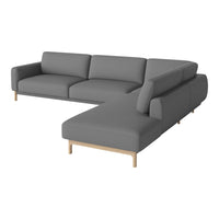 Gray sectional sofa with smooth fabric and wooden legs, featuring a modern and minimalist design.