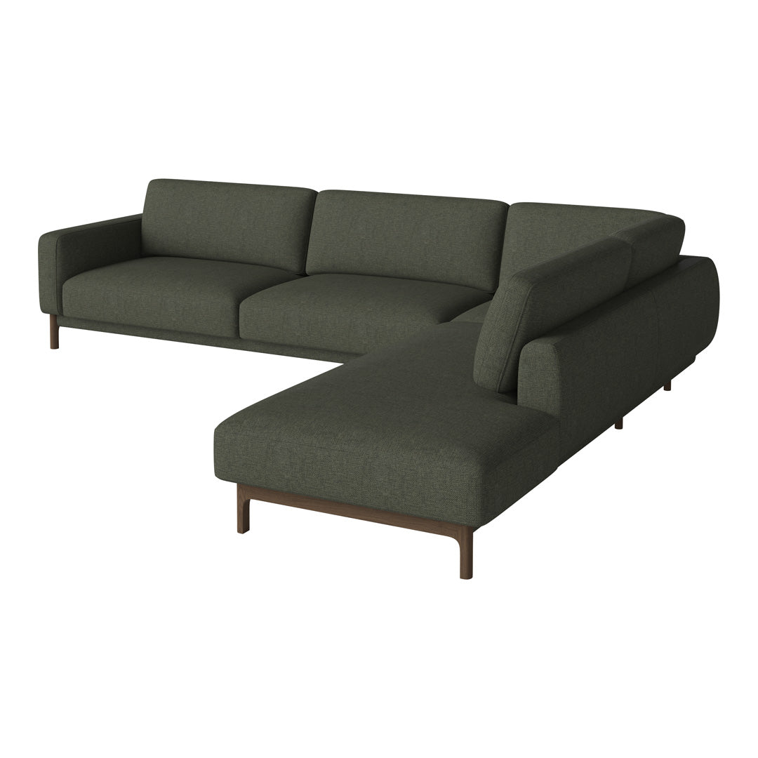 Dark green fabric sectional sofa with clean lines and a modern design, featuring smooth, textured upholstery.