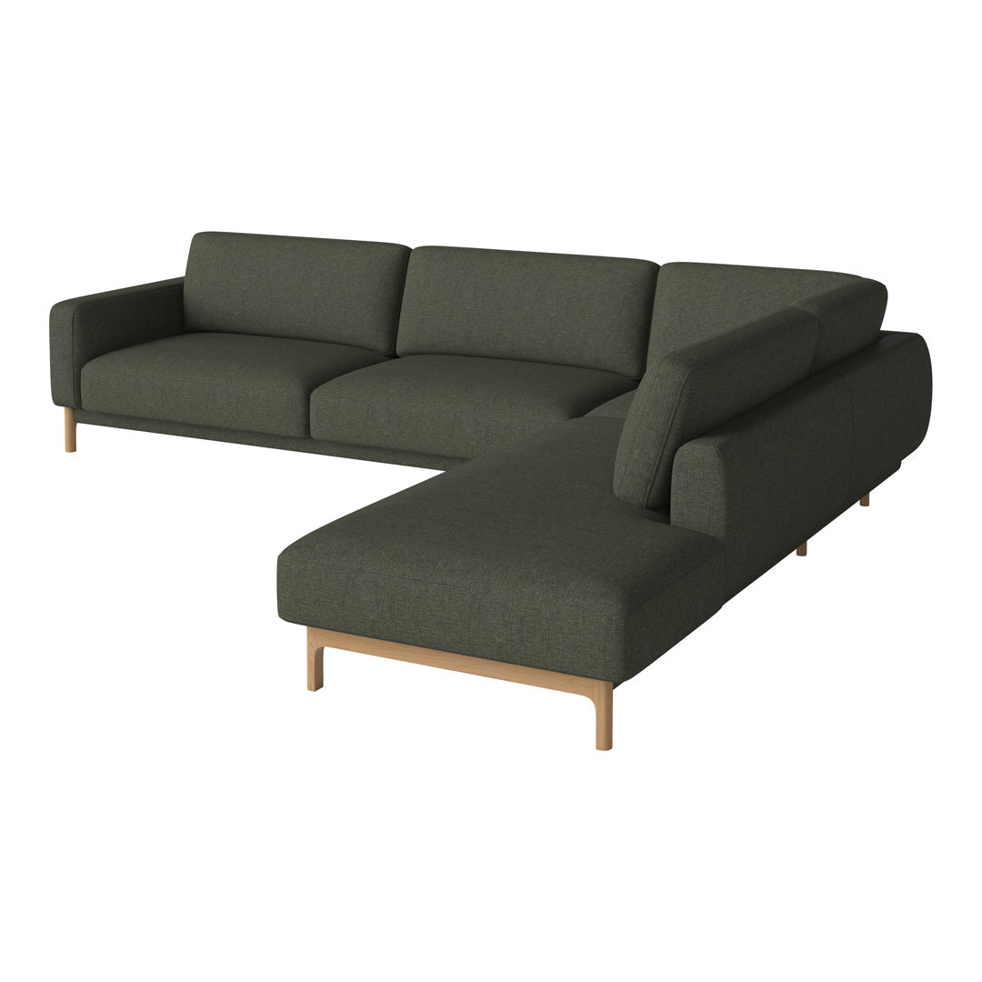 Dark green modular sofa with clean lines, featuring a smooth fabric texture and light wooden legs.