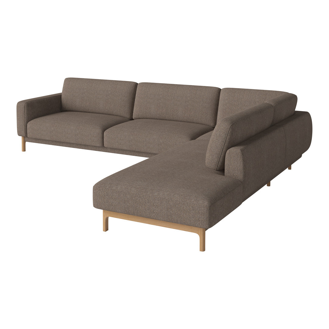 "Modern L-shaped sofa in soft taupe fabric with clean lines and light wooden legs, versatile for any living space."