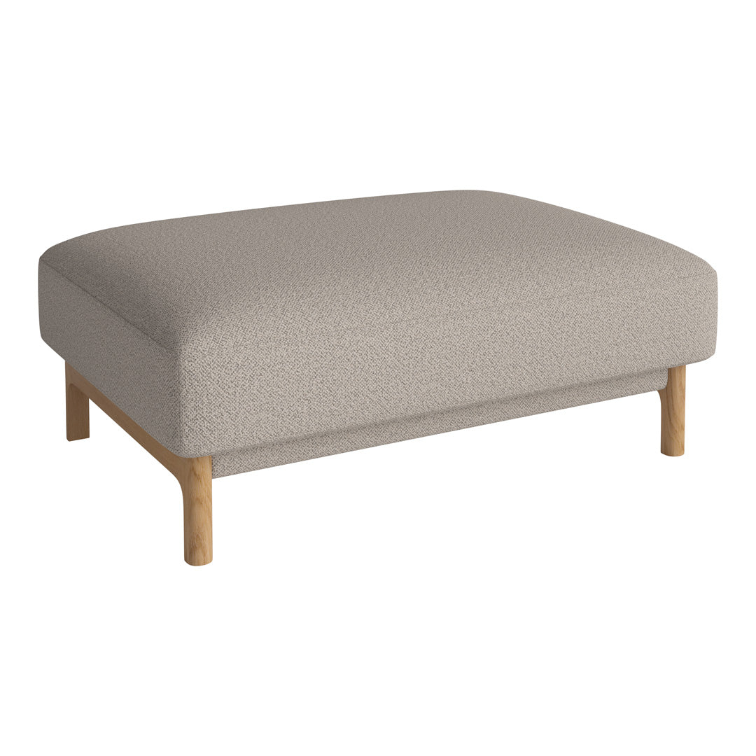 Light beige upholstered ottoman with subtle texture and natural wood legs, perfect for modern decor.