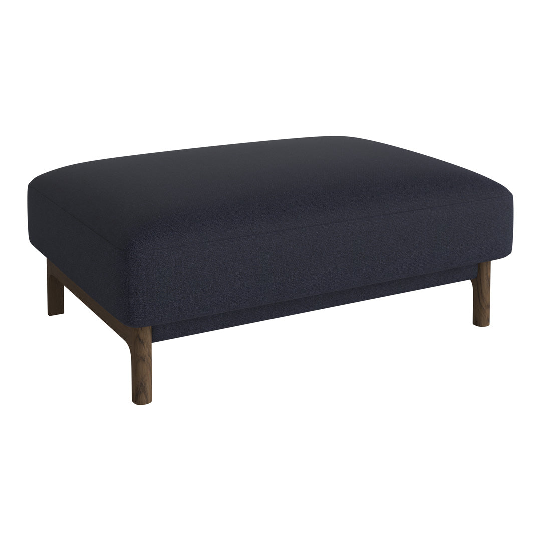 Dark blue upholstered ottoman with a smooth surface and wooden legs, perfect for modern decor. 