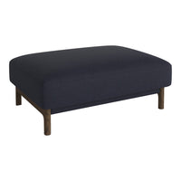 Dark blue upholstered ottoman with a smooth surface and wooden legs, perfect for modern decor. 