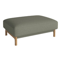 Olive green upholstered ottoman with a minimalist design and natural wood legs, perfect for modern decor.