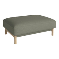 Stylish green upholstery ottoman with a minimalist wooden base, ideal for modern decor.