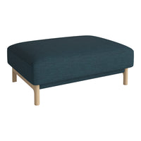 Teal upholstered ottoman with a smooth finish and light wood legs. Ideal for modern living spaces.
