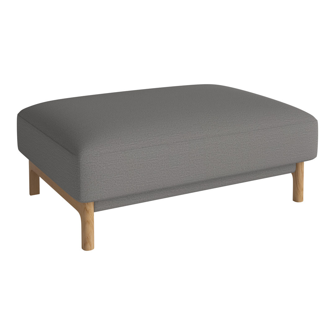 Gray upholstered ottoman with a smooth surface and natural wood legs, perfect for modern décor.