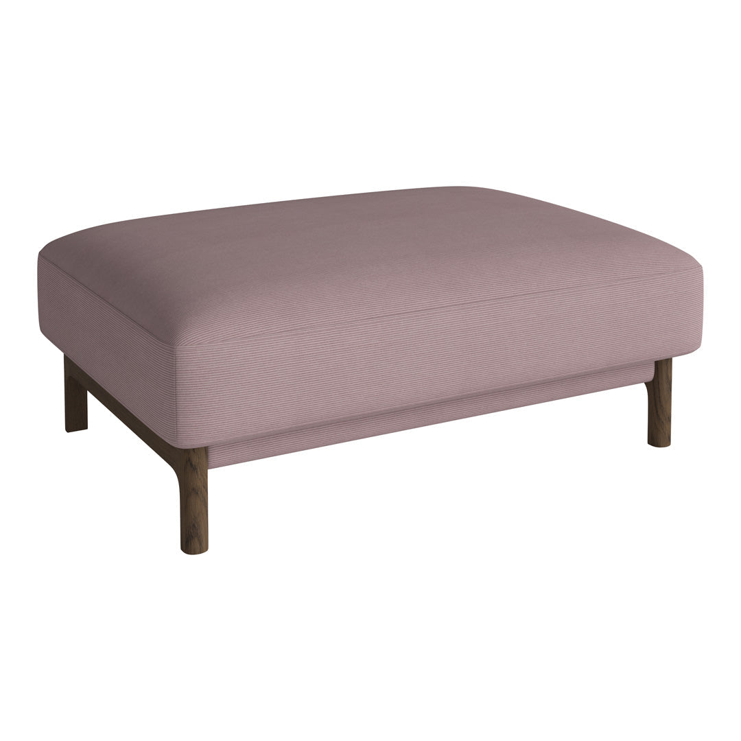 Light pink ottoman with a smooth fabric finish and wooden legs, perfect for a modern living space.