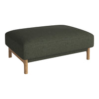 Dark green upholstered ottoman with a smooth texture and natural wood legs. Modern and minimalist design.
