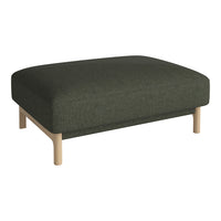 Green upholstered ottoman with a smooth texture and light wooden legs, creating a modern, minimalist look.