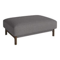 Gray upholstered ottoman with a textured fabric and wooden legs, perfect for modern living spaces.
