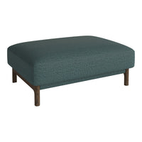 Teal upholstered ottoman with a textured pattern and dark wooden legs. Stylish addition for modern decor.