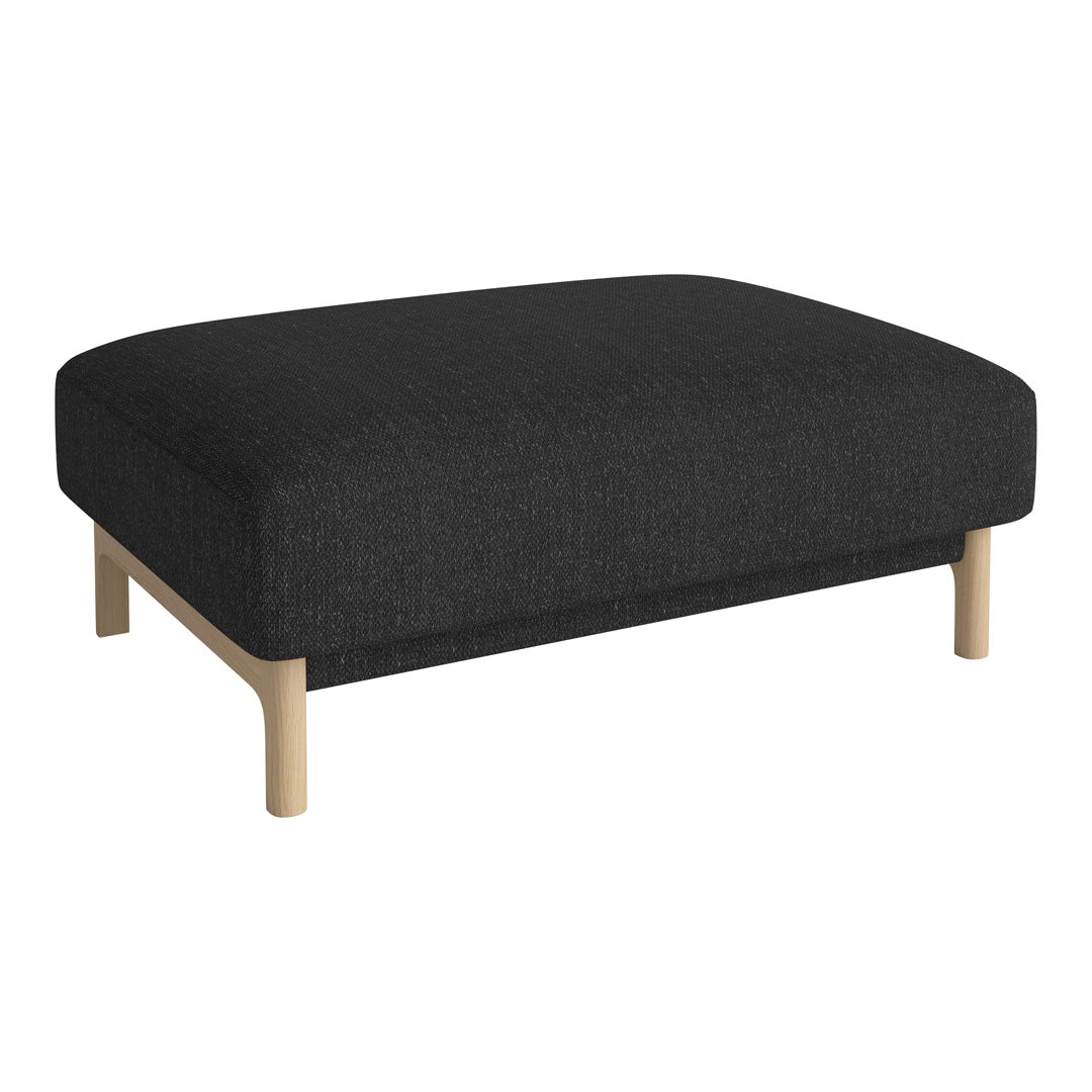 Black upholstered ottoman with a smooth texture and natural wood legs in a minimalist design.