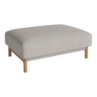 Light gray upholstered ottoman with a simple, textured pattern and natural wood legs for a modern touch.
