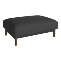 Dark gray upholstered ottoman on a wooden base, featuring a smooth, minimalist design.
