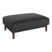 Dark gray fabric ottoman with a simple, modern design and wooden legs. Perfect for stylish living spaces.