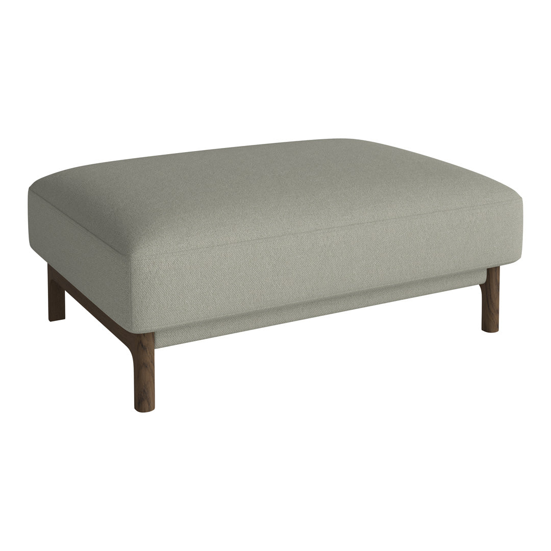 Light gray upholstered ottoman with a simple design and wooden legs, perfect for any modern living space.