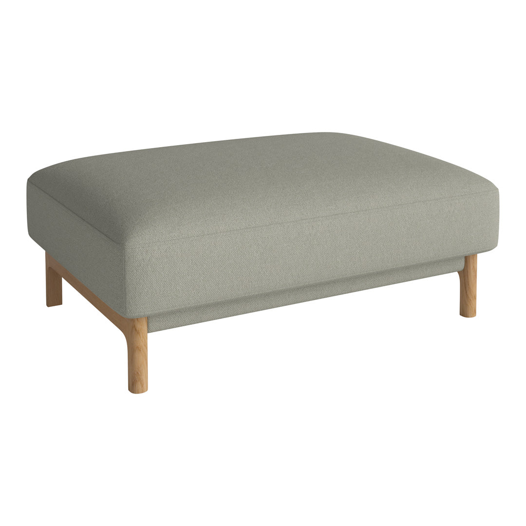 Light gray upholstered ottoman with a simple, modern design and natural wood legs, perfect for contemporary decor.