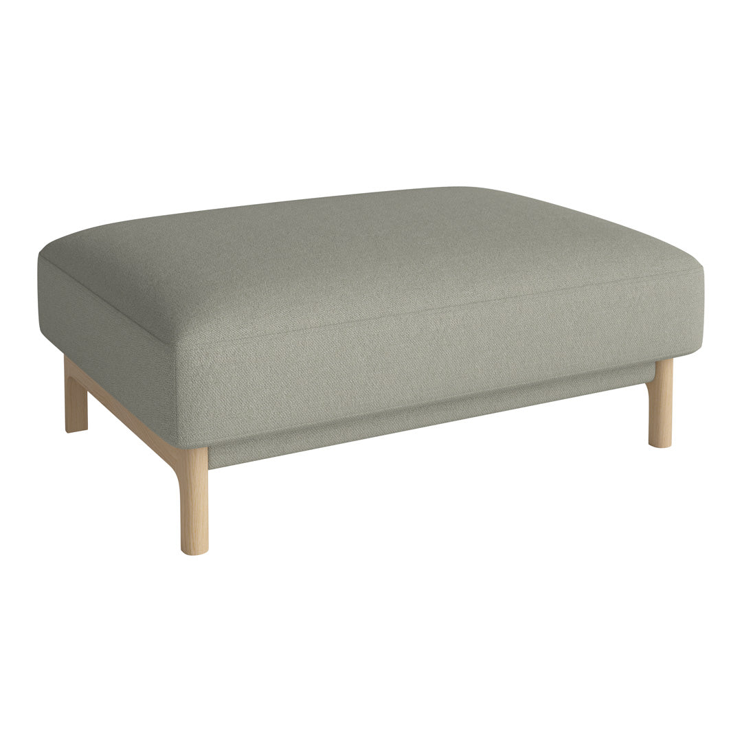 Light grey upholstered ottoman with a minimalist design and natural wooden legs. Perfect for modern interiors.