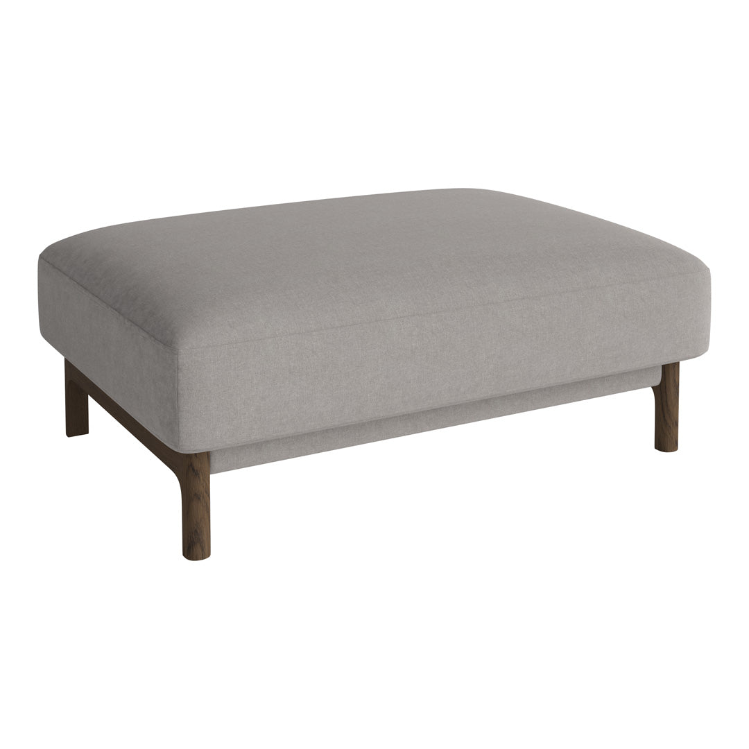 Light gray upholstered ottoman with a simple design and dark wood legs. Perfect for modern decor.