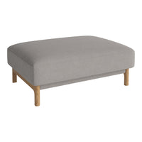 Light gray upholstered ottoman with a minimalist design and natural wood legs. Perfect for modern decor.