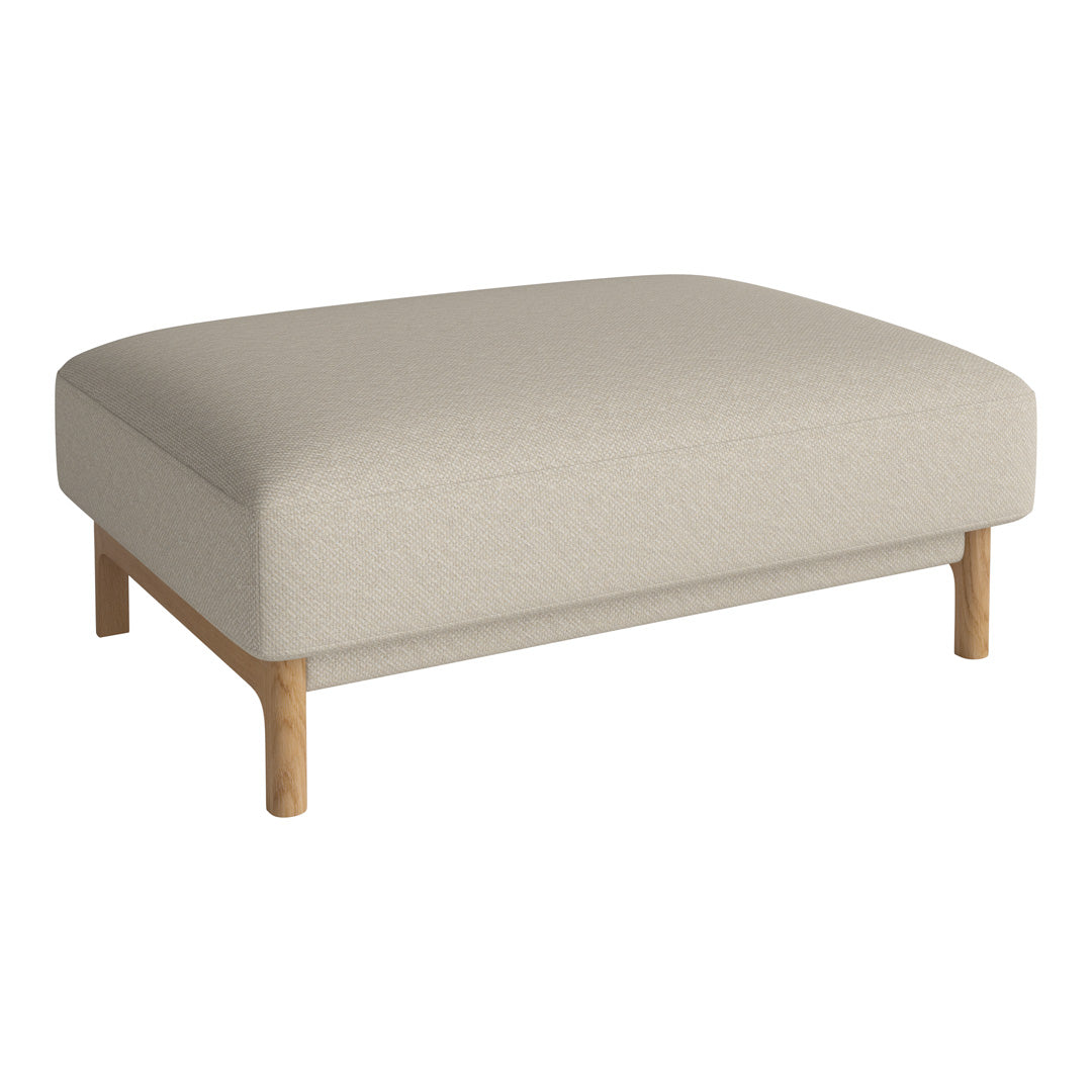 Beige upholstered ottoman with a simple texture and natural wood legs. Ideal for modern and minimalist decor.
