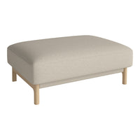 Beige upholstered ottoman with a smooth texture and light wood legs, perfect for modern decor.