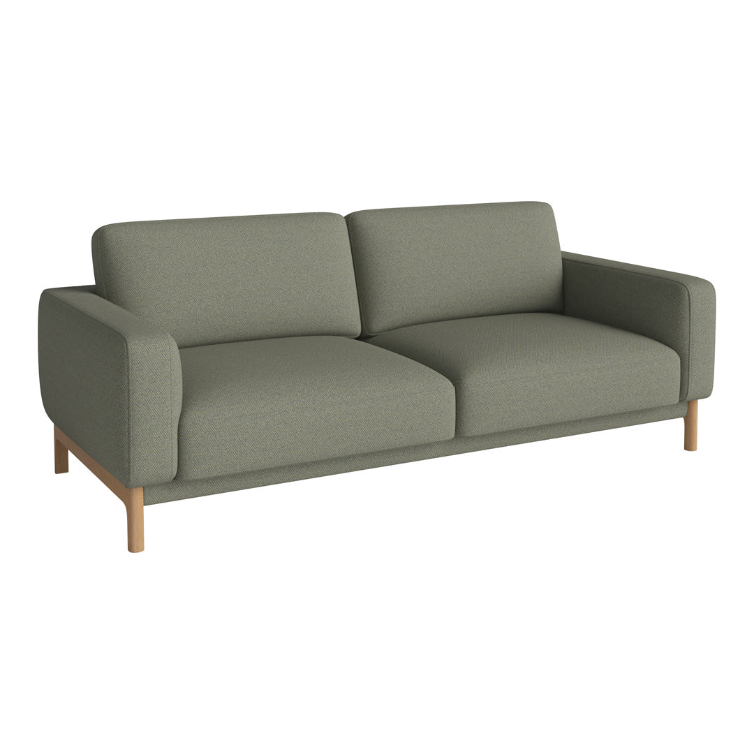 Sleek green fabric sofa with minimalistic design and wooden legs, perfect for modern living spaces.