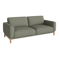 Sleek green fabric sofa with minimalistic design and wooden legs, perfect for modern living spaces.