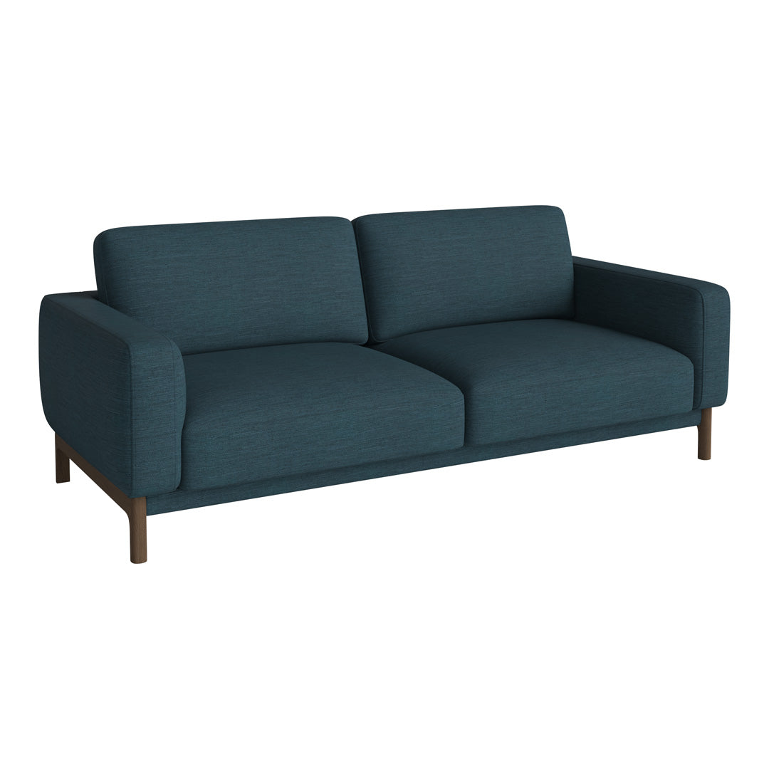 Teal upholstered sofa with a smooth texture and modern design, featuring clean lines and wooden legs.