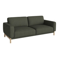 Dark green fabric sofa with clean lines and light wood legs, ideal for modern living spaces.