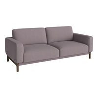 Soft lavender sofa with smooth upholstery and minimalist design, featuring sturdy wooden legs.