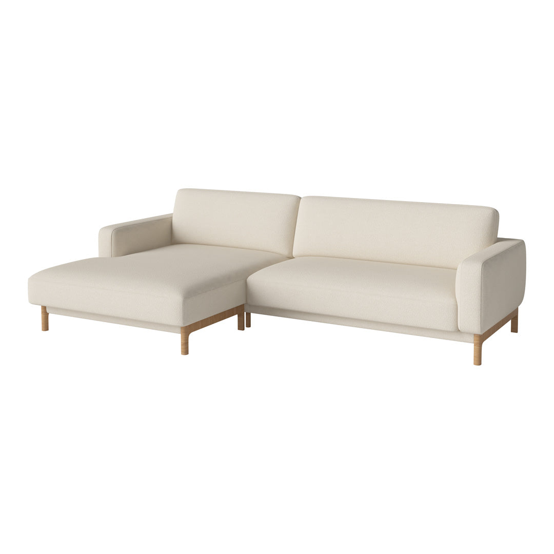 Modern cream sectional sofa with clean lines and light wood legs, perfect for minimalist decor.