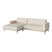 Modern cream sectional sofa with clean lines and light wood legs, perfect for minimalist decor.