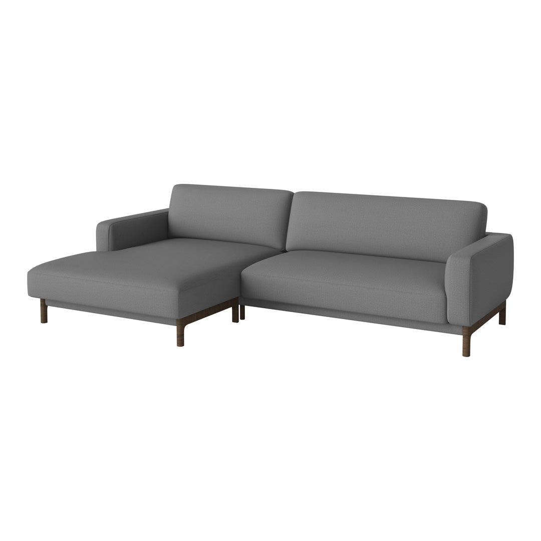 Grey fabric sectional sofa with a smooth texture and minimalist design, featuring dark wood legs. Perfect for modern decor.