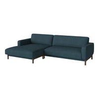 Dark teal sectional sofa with a clean, minimalist design and solid wood legs. Perfect for modern living spaces.