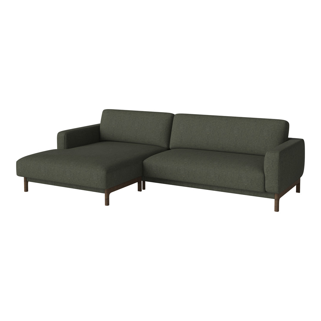 Stylish dark green sectional sofa with a smooth texture and minimalist design, perfect for modern living spaces.