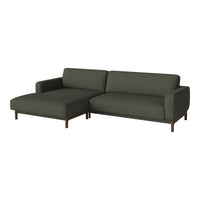 Stylish dark green sectional sofa with a smooth texture and minimalist design, perfect for modern living spaces.