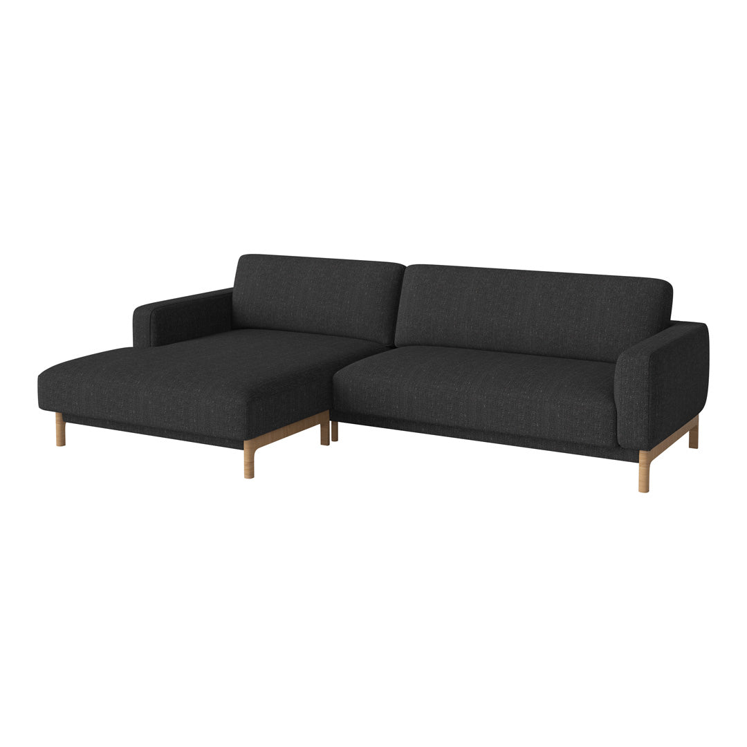 Modern dark gray sectional sofa with clean lines and a textured fabric, complemented by light wooden legs.