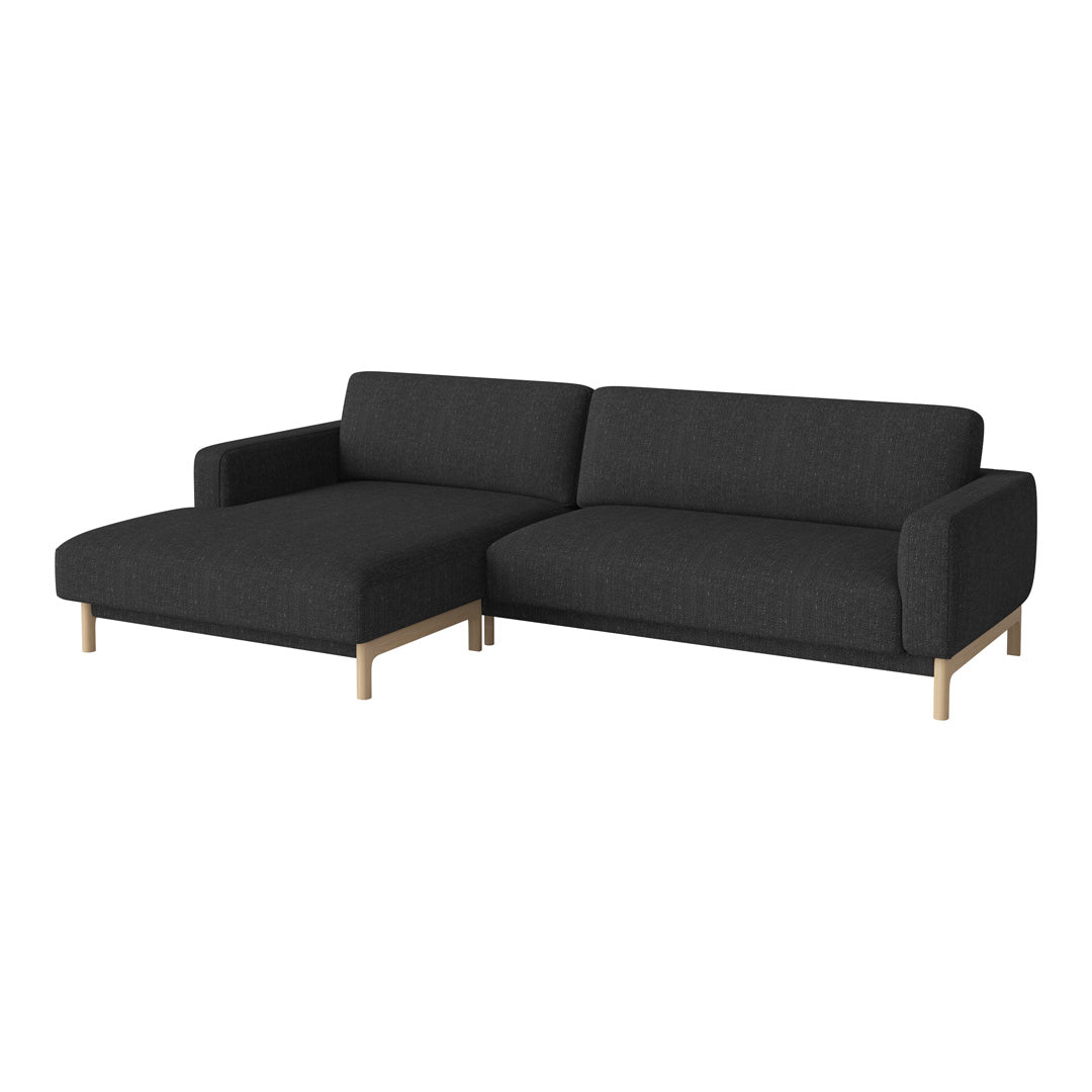 Modern dark gray sofa with clean lines and minimalist wood legs, featuring a simple textured fabric pattern.