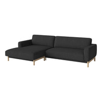 Modern dark gray sofa with clean lines and minimalist wood legs, featuring a simple textured fabric pattern.