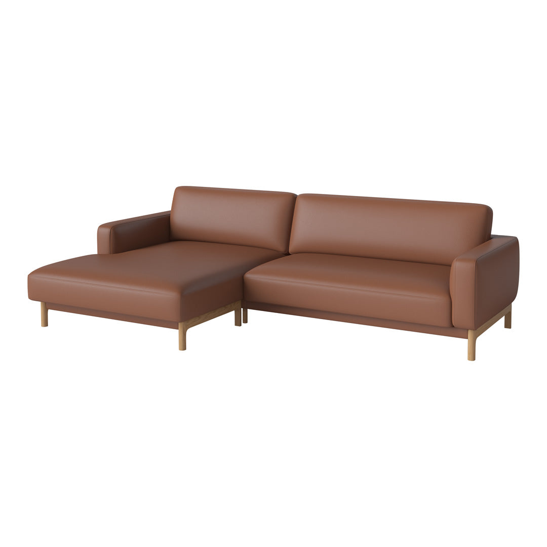 Brown leather sectional sofa with sleek lines and a modern design, featuring a warm, inviting finish.