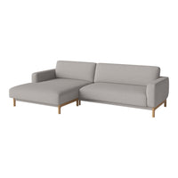 Light gray sectional sofa with smooth fabric, featuring clean lines and natural wood legs. Perfect for modern decor.