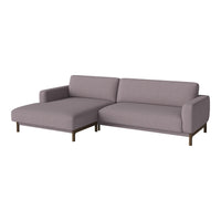 Modern grey sectional sofa with a sleek design and soft fabric upholstery, ideal for contemporary living spaces.