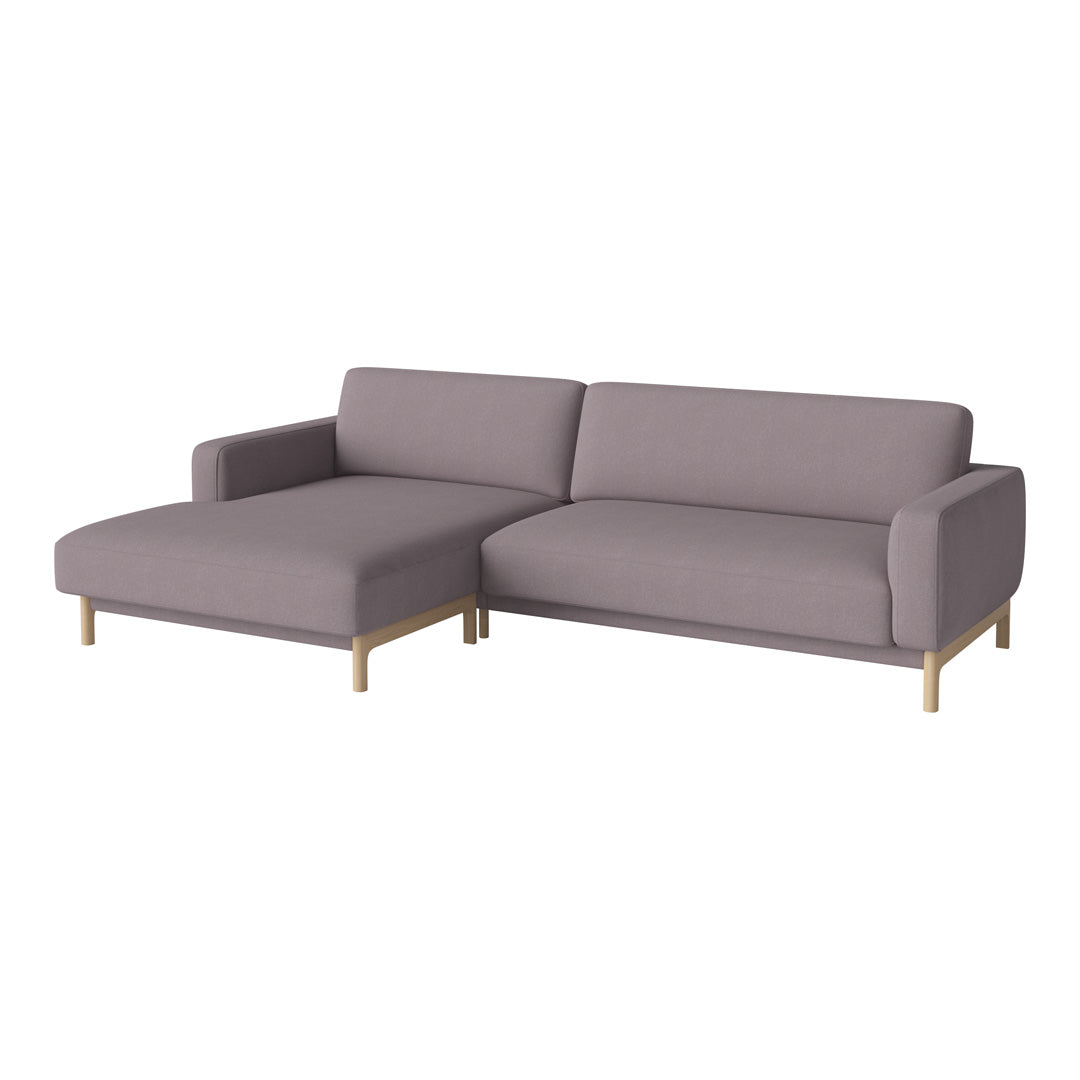 Light gray sectional sofa with simple, modern design and wooden legs. Ideal for contemporary living spaces.