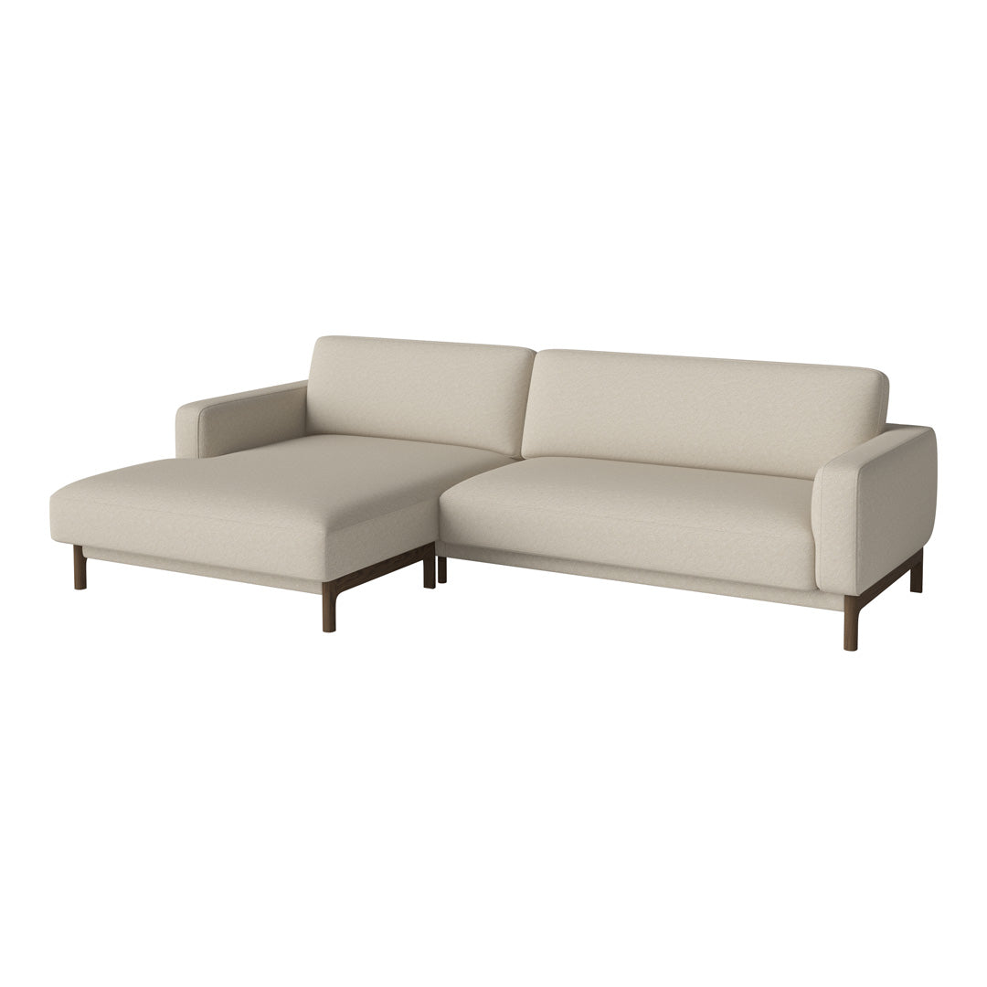 Light beige modern L-shaped sofa with a minimalist design and smooth fabric upholstery. Perfect for any living space.
