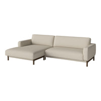 Light beige modern L-shaped sofa with a minimalist design and smooth fabric upholstery. Perfect for any living space.