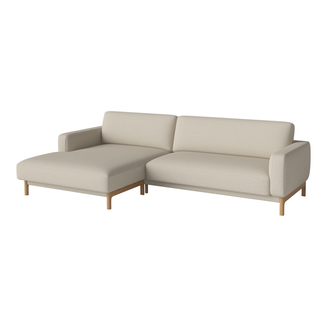 Beige sectional sofa with clean lines and wooden legs, offering a minimalist design perfect for modern interiors.