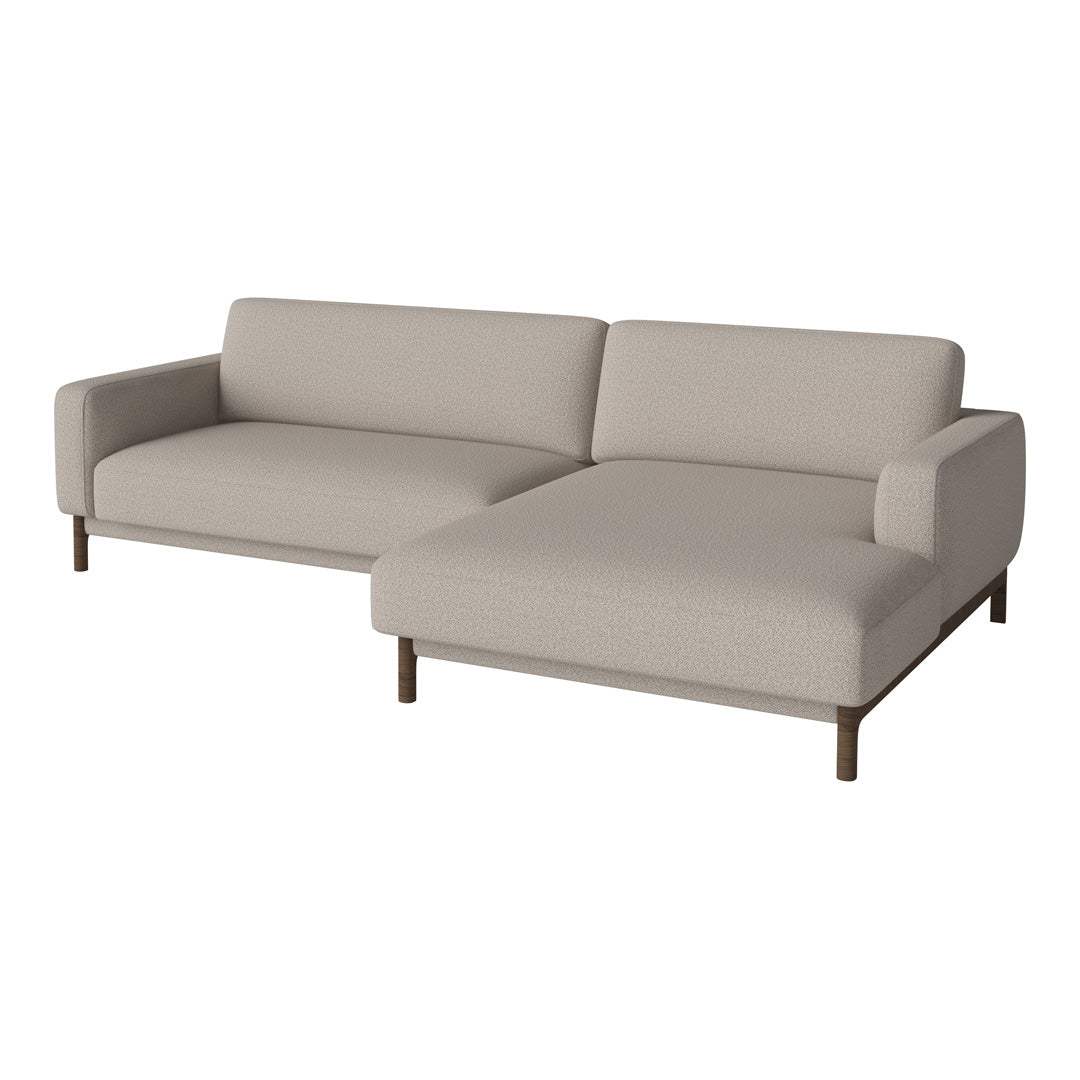 Beige sectional sofa with clean lines and minimalistic design, featuring a smooth fabric texture and wooden legs.